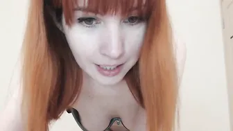 AnnaBoleyn Busty Shmara caresses her lips.