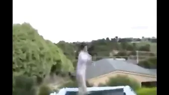 Nicole Aniston black haired prostitute posing in clothes