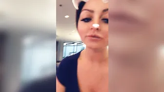 Sophie Dee greedily fucks her pussy