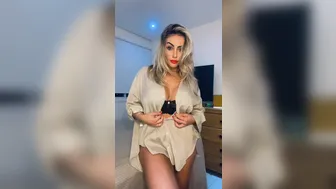 A Dani Buenno aka dbuennoa onlyfans  undressed in front of the camera